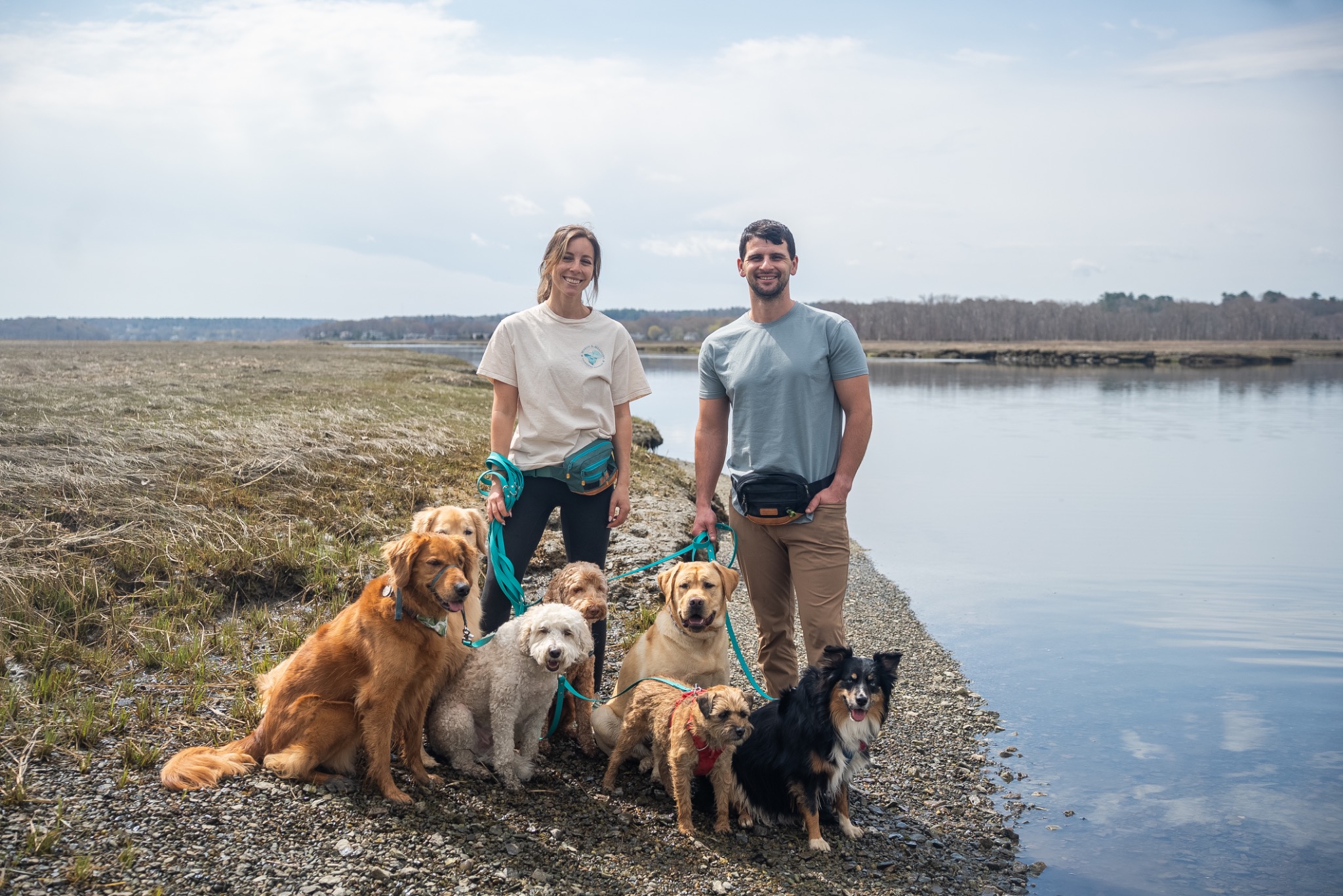 Anna and Jake Turner with the pack beside the marsh